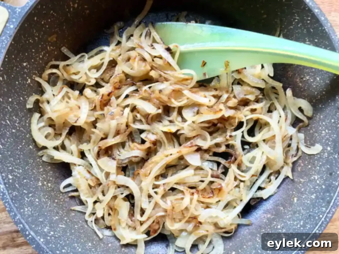 Onions caramelizing to a golden brown