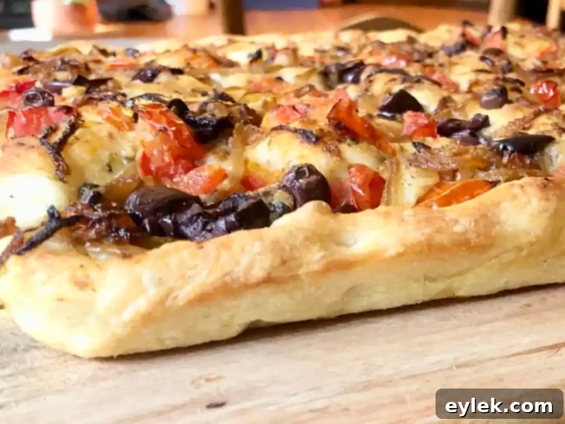 Sliced Pissaladière with Anchovies, Tomatoes & Olives