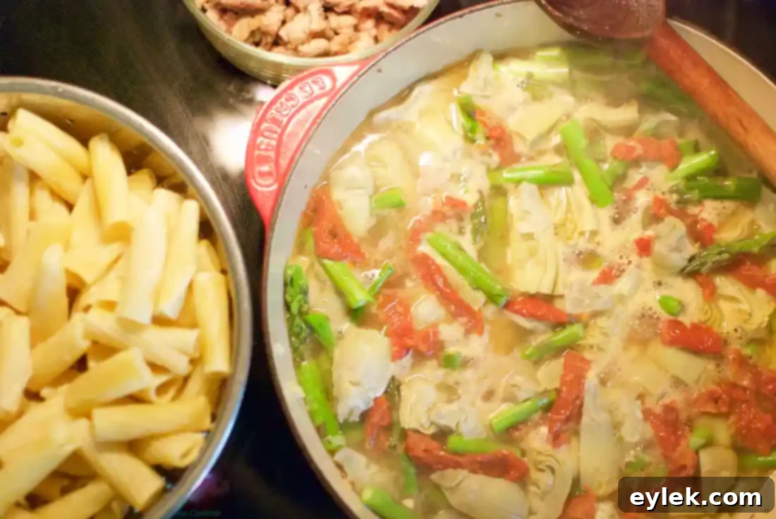 Sautéing artichokes, asparagus, and garlic in a pan, releasing aromas
