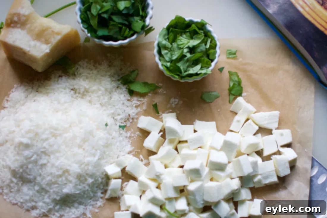 Rigatoni pasta being mixed with the flavorful sauce, sausage, artichokes, and asparagus