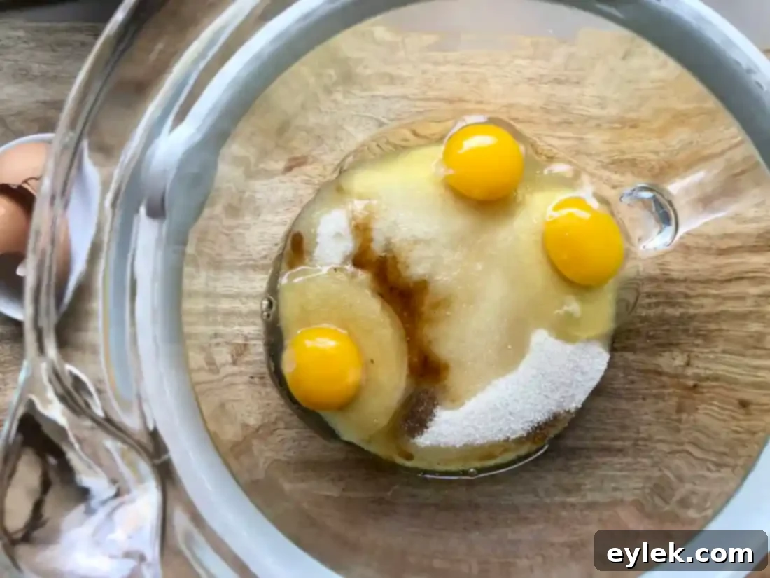 Adding melted chocolate to egg mixture for cookies