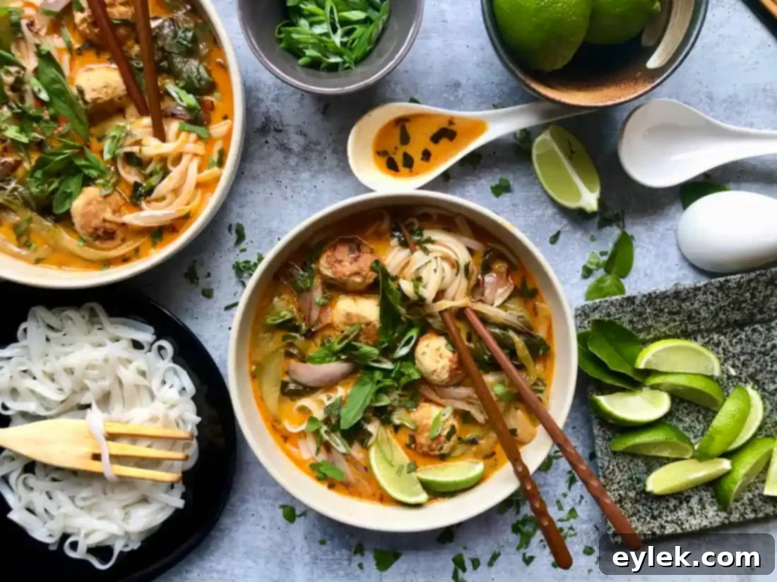 thai coconut curry noodle soup with chicken meatballs