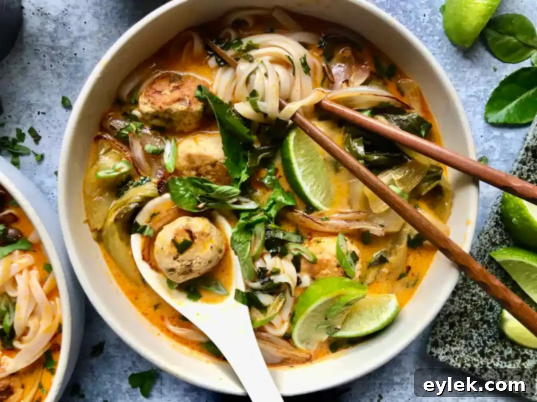 thai coconut curry noodle soup with chicken meatballs