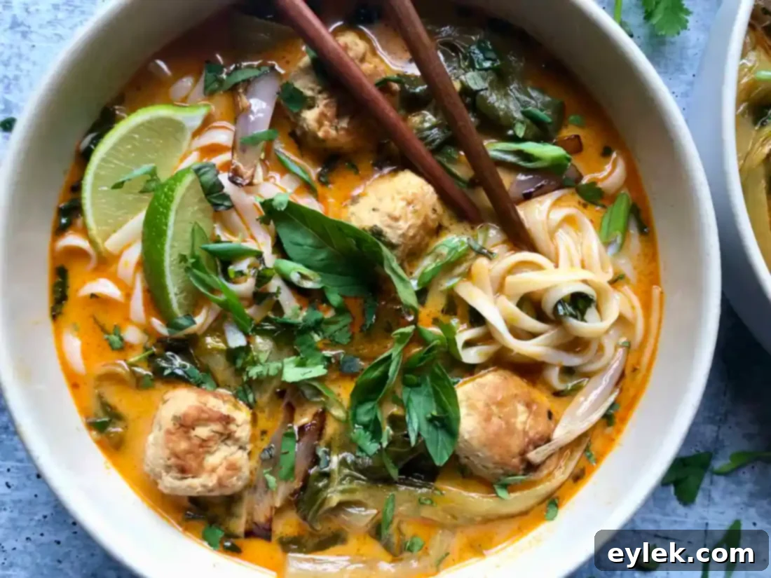 thai coconut curry noodle soup with chicken meatballs