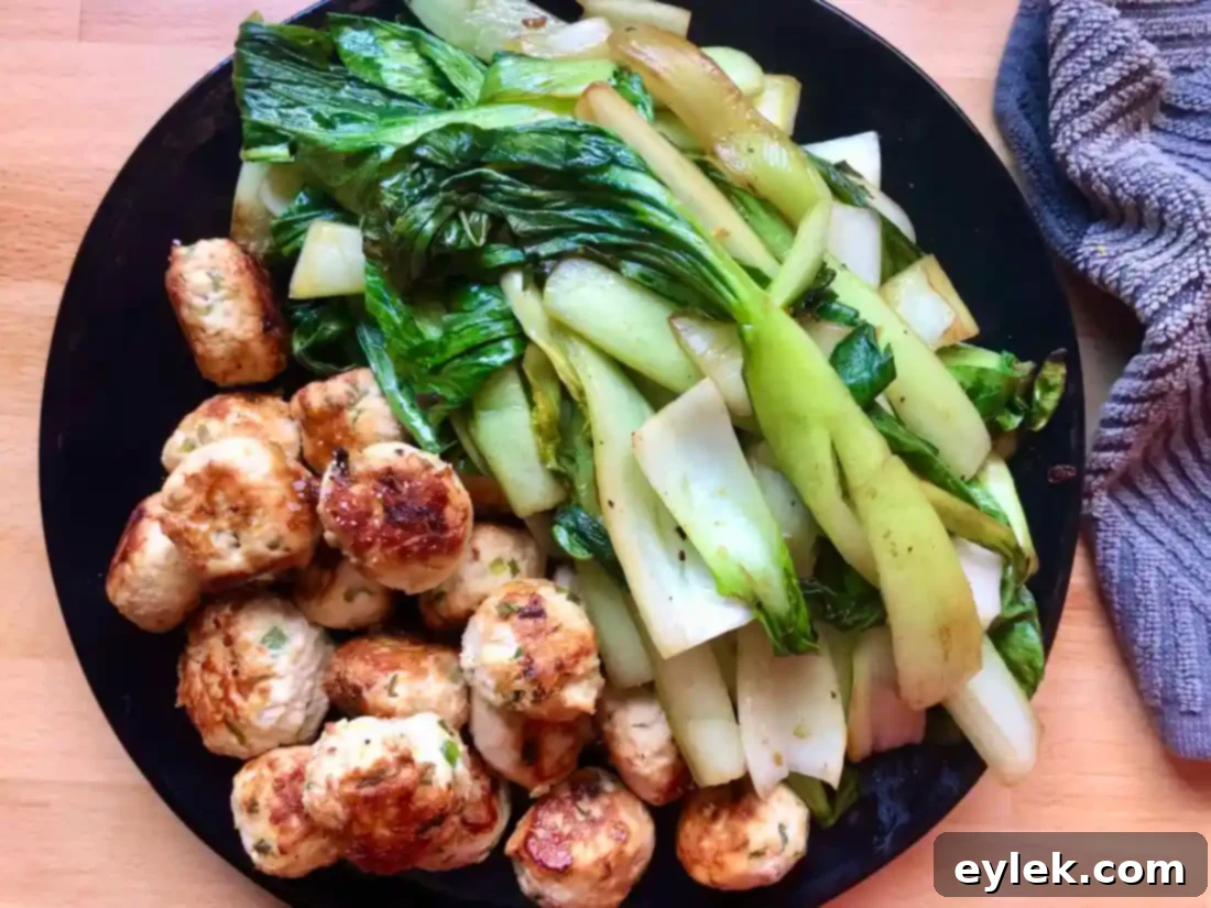 thai coconut curry noodle soup with chicken meatballs
