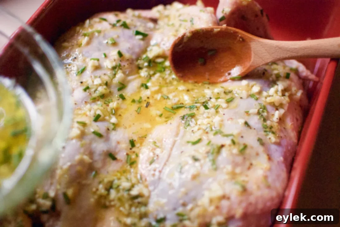 grilled brick chicken with tapenade - chicken marinating