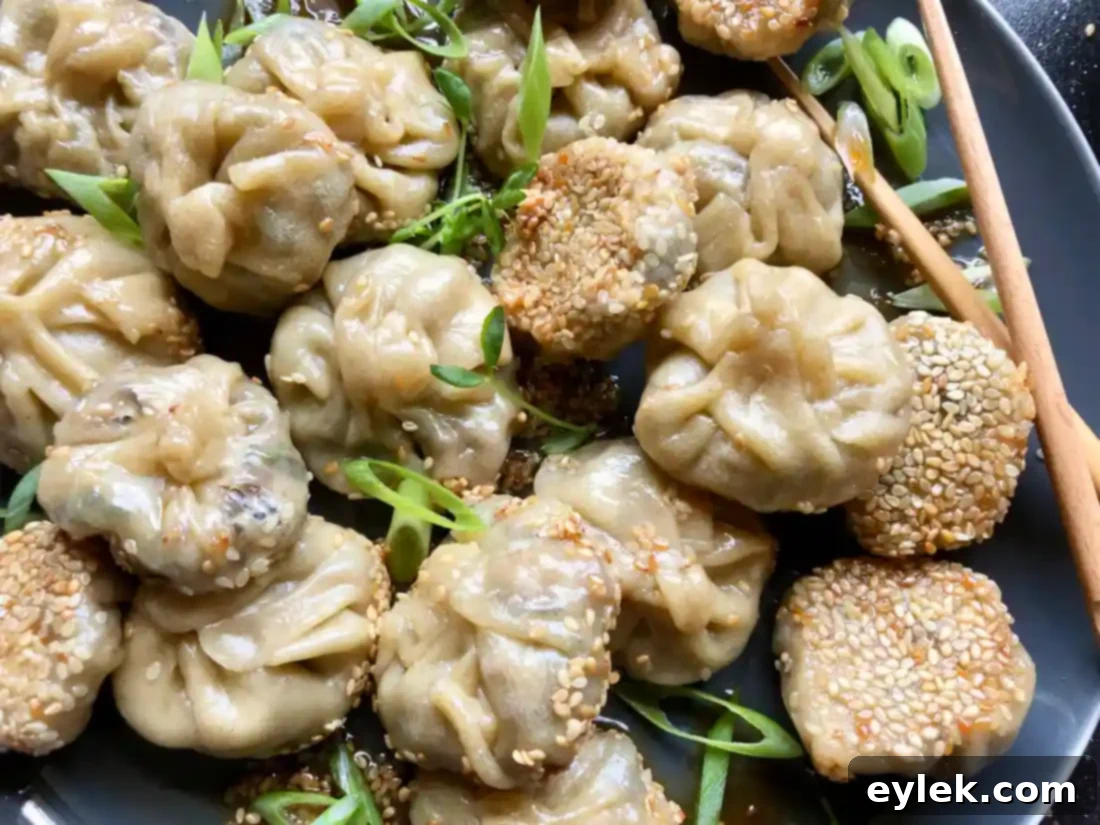 Dumplings Steaming in Skillet