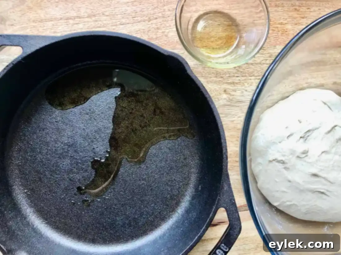 cast iron skillet with olive oil