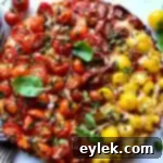 Cast Iron Pizza Bursting with Tomatoes 21 loaded with tomatoes cast iron pizza