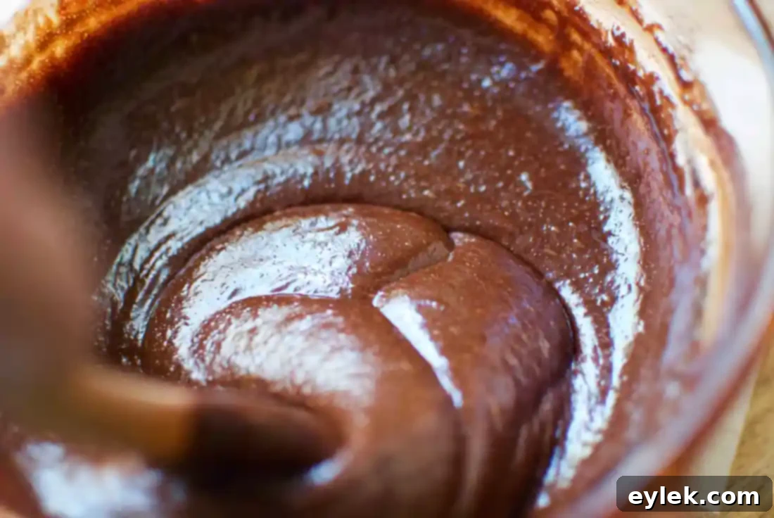 Adding chocolate chips to gluten-free cookie batter