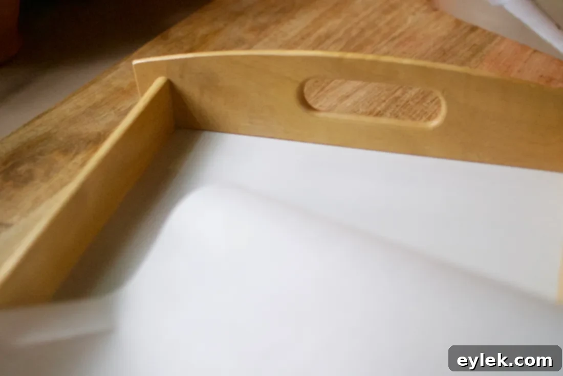 Empty serving platter lined with parchment paper.