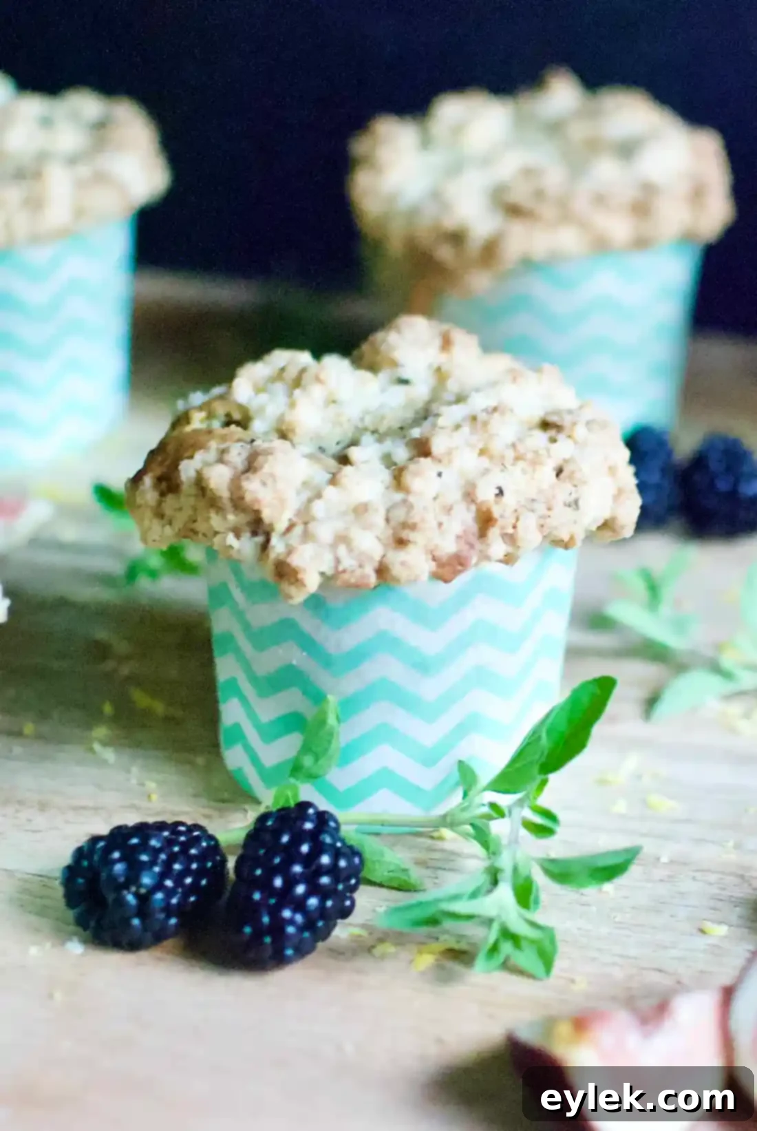 Beautifully arranged Blackberry, Lemon & Thyme Muffins, ready to be enjoyed