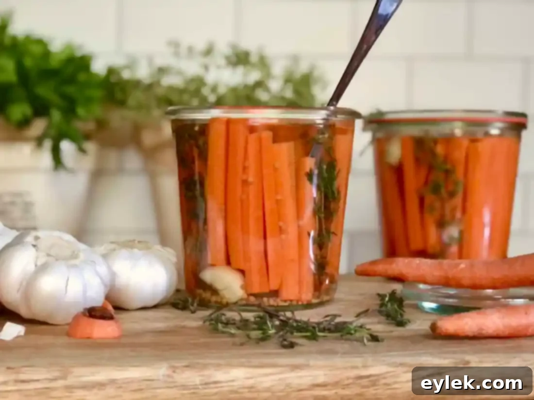 Close-up of freshly made pickled carrots in a jar, ready to eat