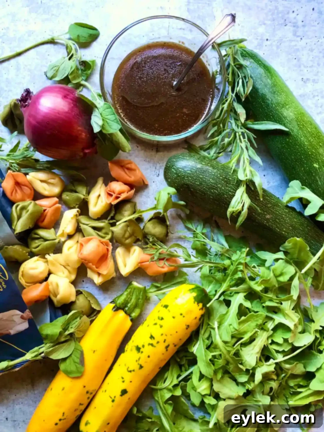 Delicious Tortelloni Salad with Grilled Zucchini, Yellow Squash, and Red Onion