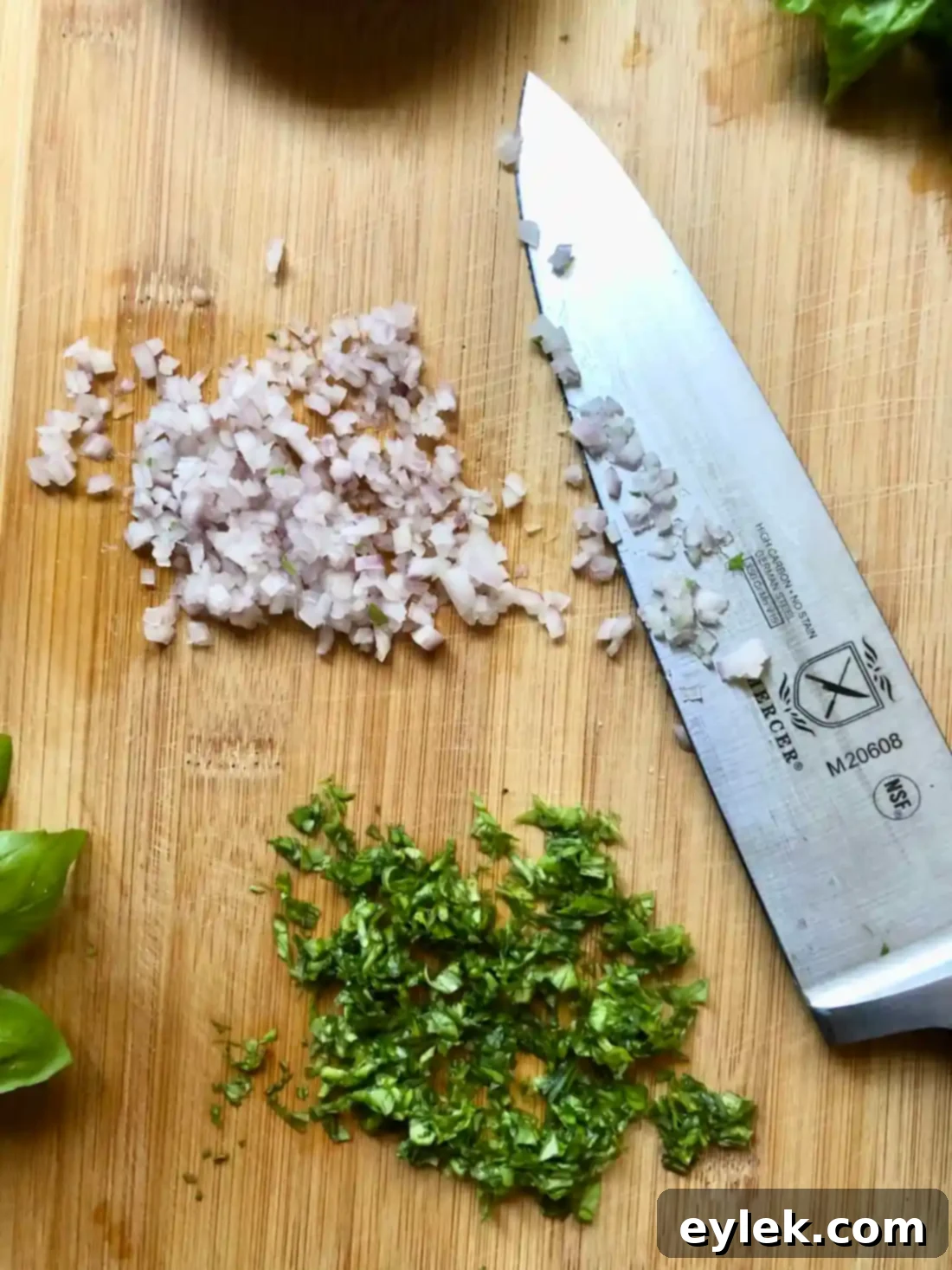 Mixing homemade balsamic vinaigrette ingredients in a bowl
