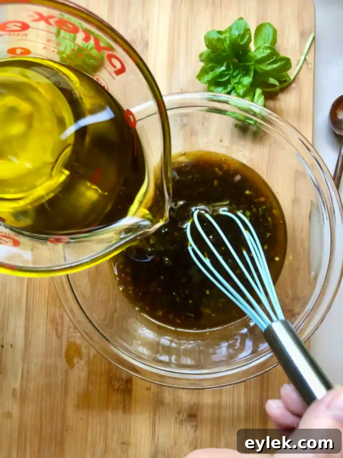 Finished homemade balsamic vinaigrette in a bowl