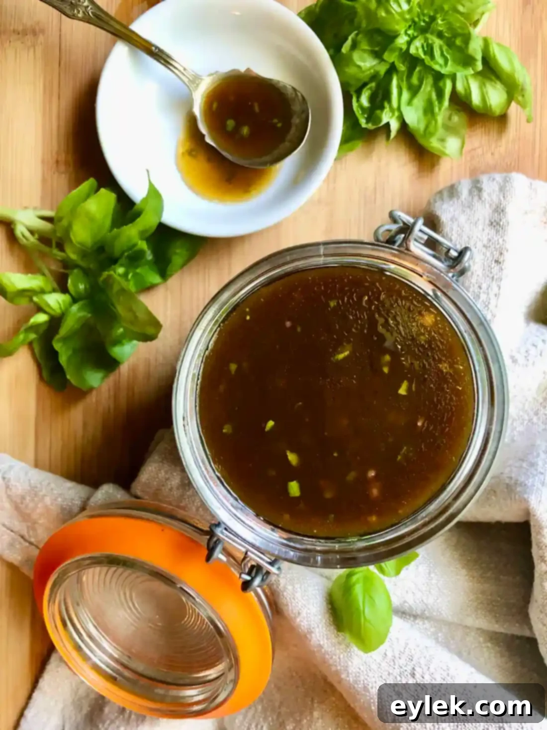 Close-up of a glass jar of homemade balsamic vinaigrette
