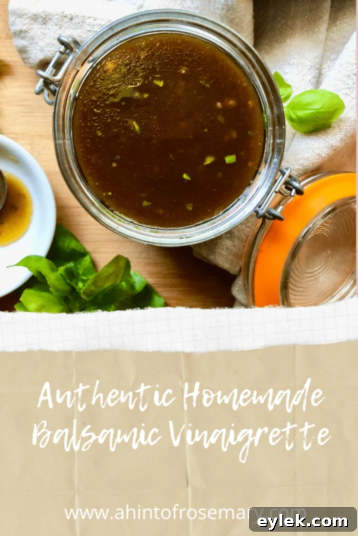 Delicious authentic homemade balsamic vinaigrette on a fresh salad with healthy ingredients.