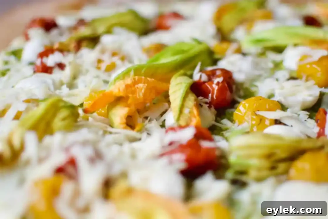 squash blossom, roasted tomato & pesto pie