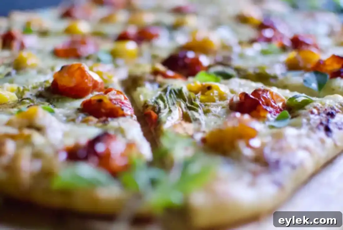squash blossom, roasted tomato & pesto pie