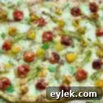 squash blossom, roasted tomato & pesto pie