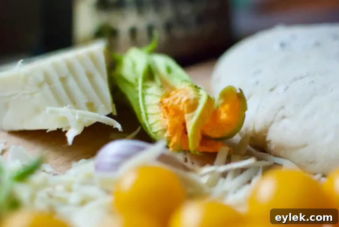squash blossom, roasted tomato & pesto pie