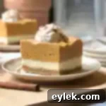 Layered Spiced Pumpkin Cheesecake Bars 27 layered pumpkin cheesecake squares
