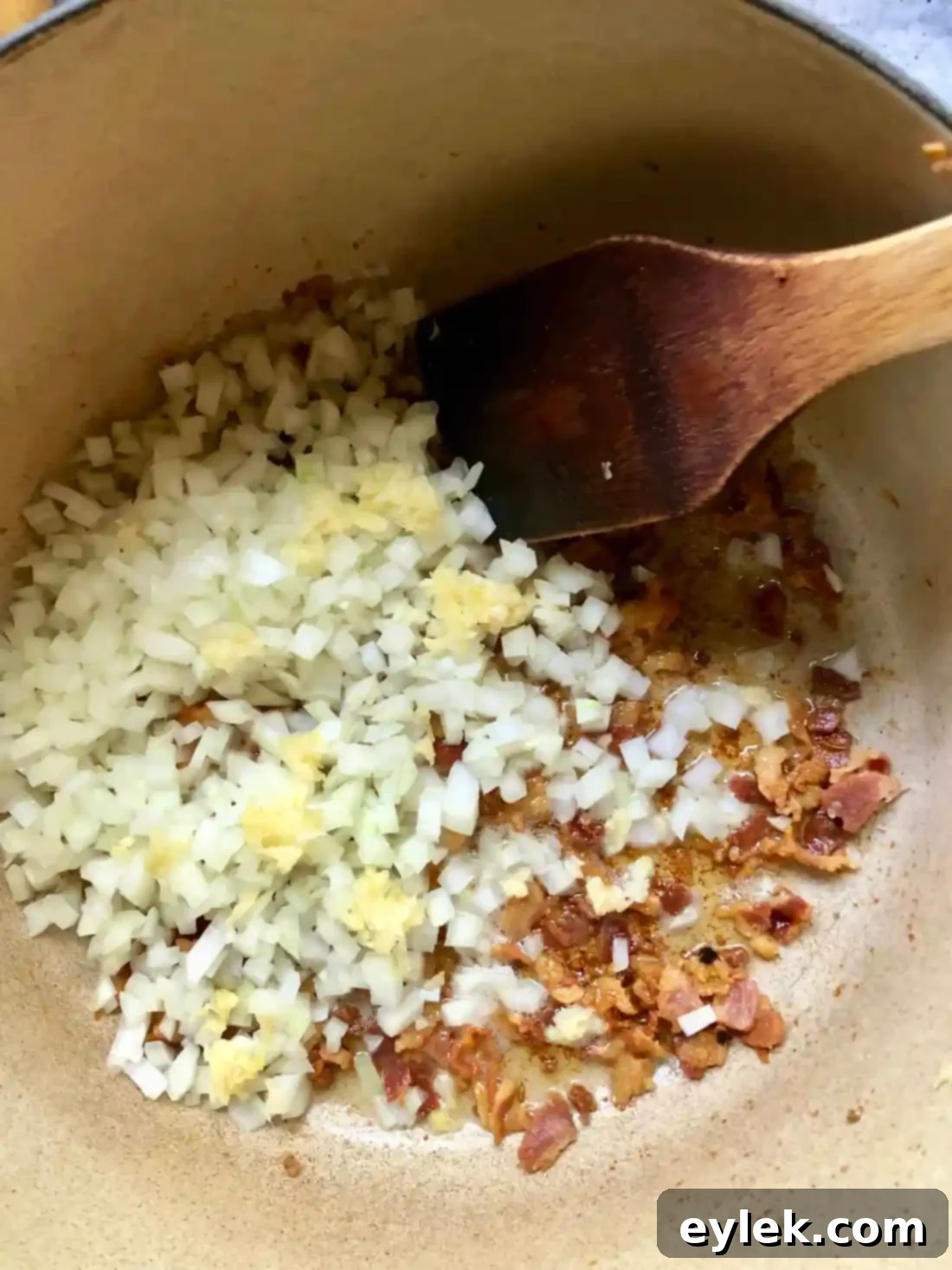 authentic homemade zuppa toscana - cooking sausage