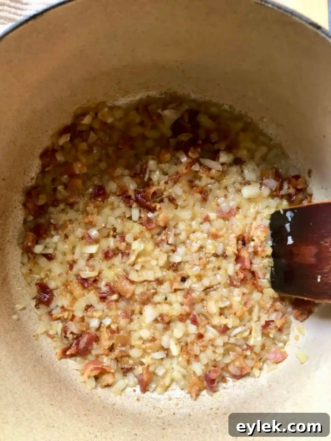 authentic homemade zuppa toscana - cooking onions and garlic