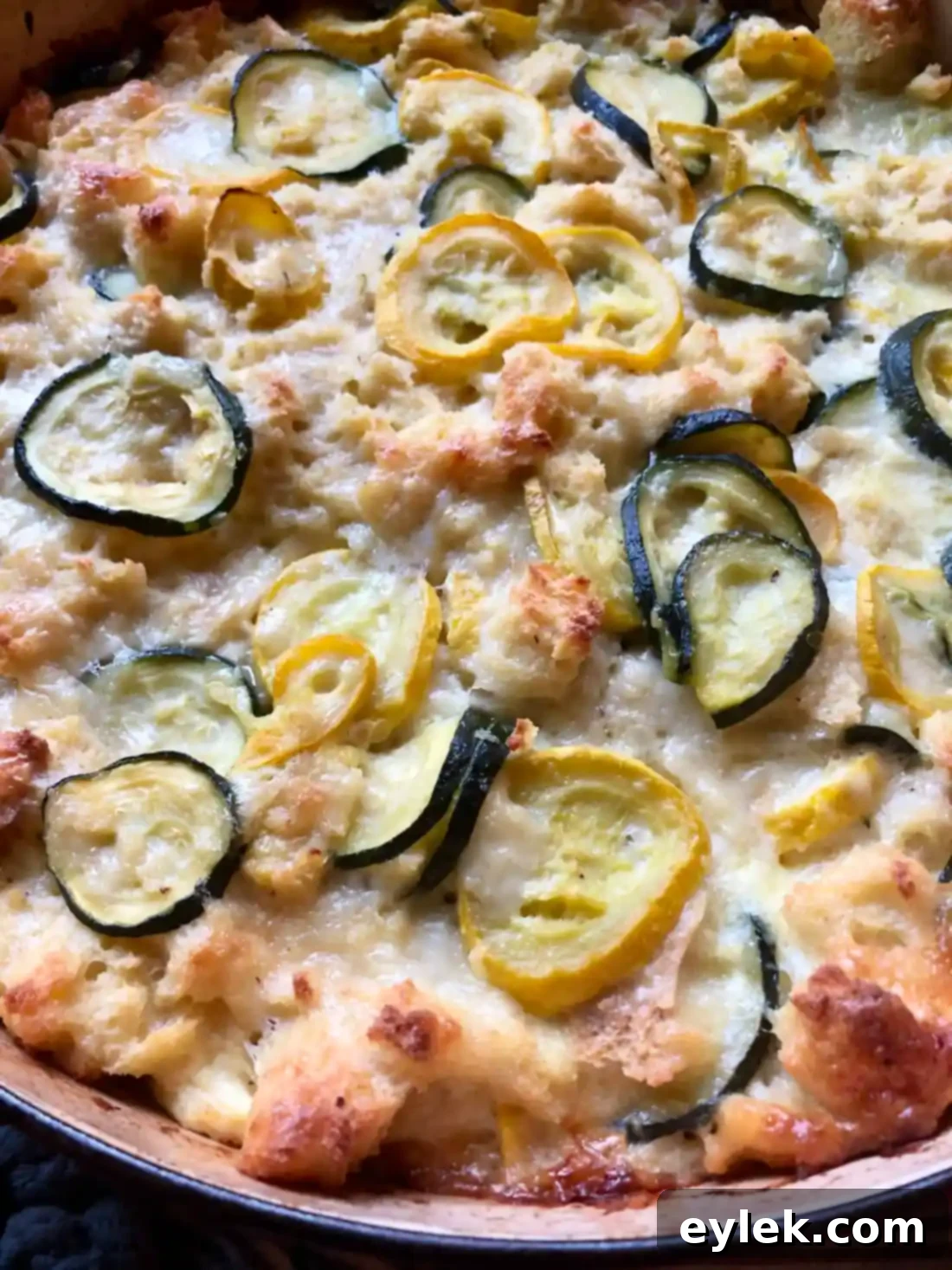 cheesy zucchini squash strata garnished