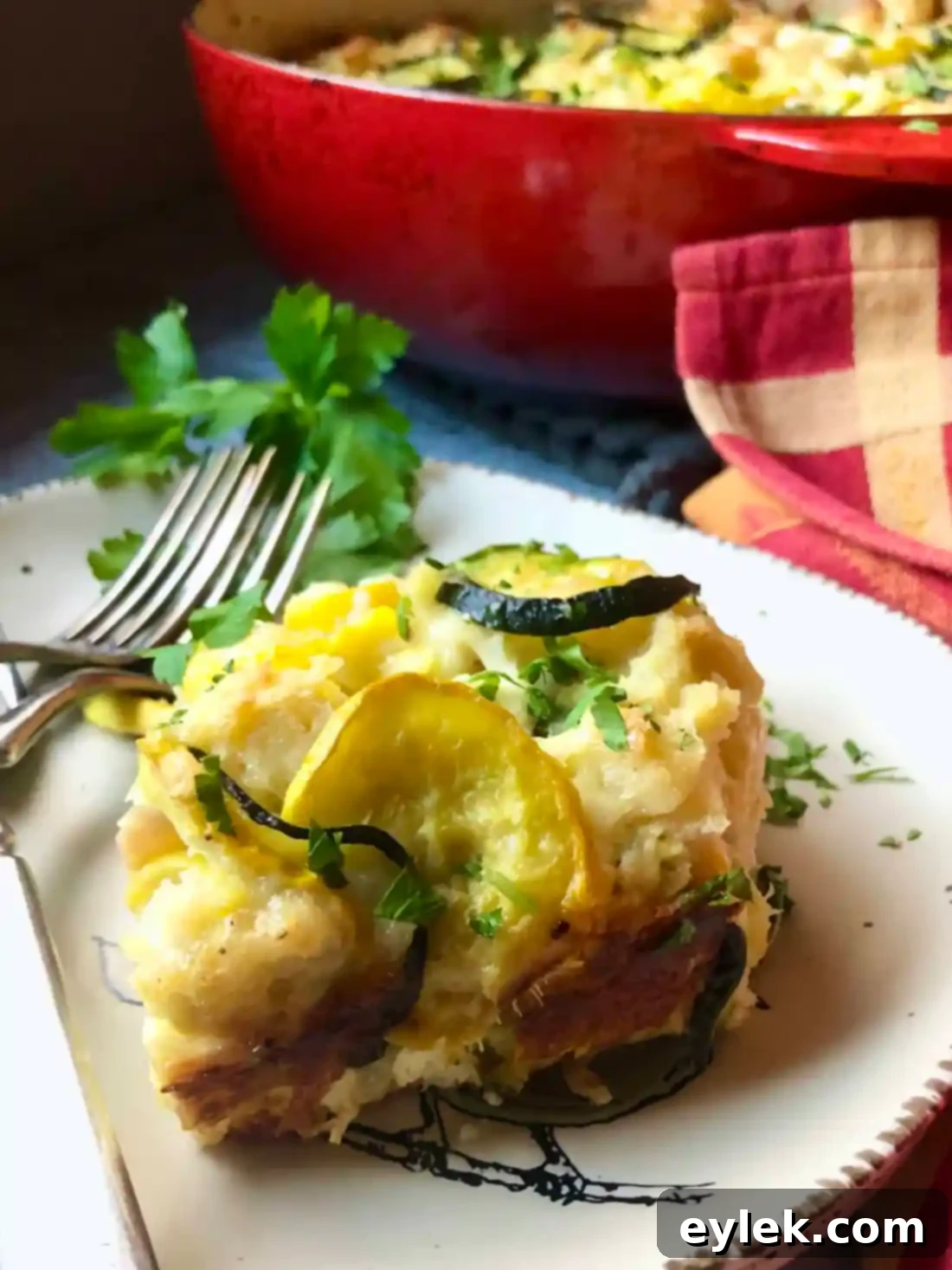 cheesy zucchini squash strata slice