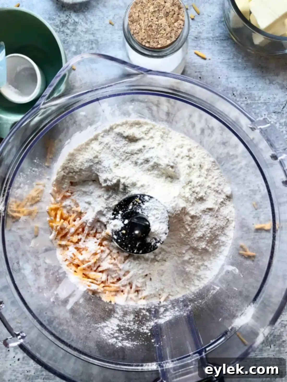 Ingredients for homemade cheese crackers laid out on a table