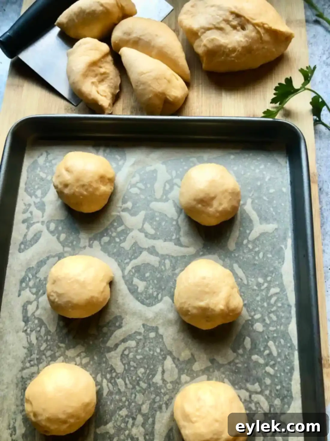 sealing the cheesy beef stuffed buns