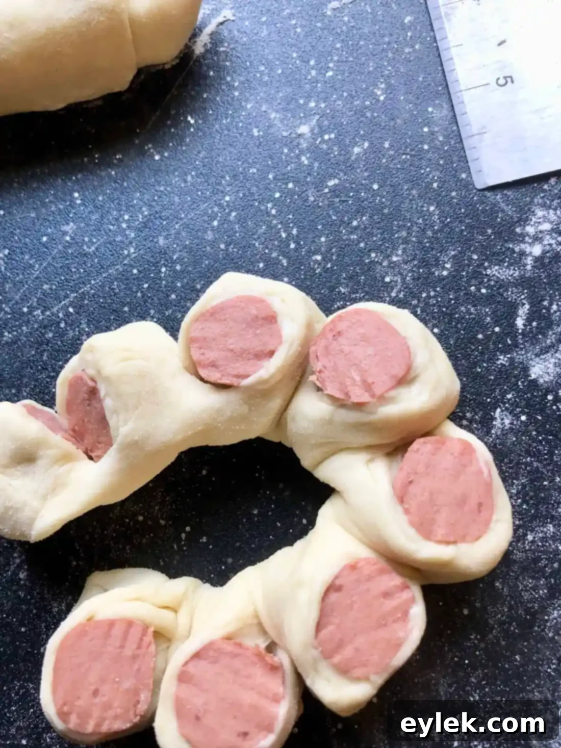 Shaped flower hot dog buns on baking sheet