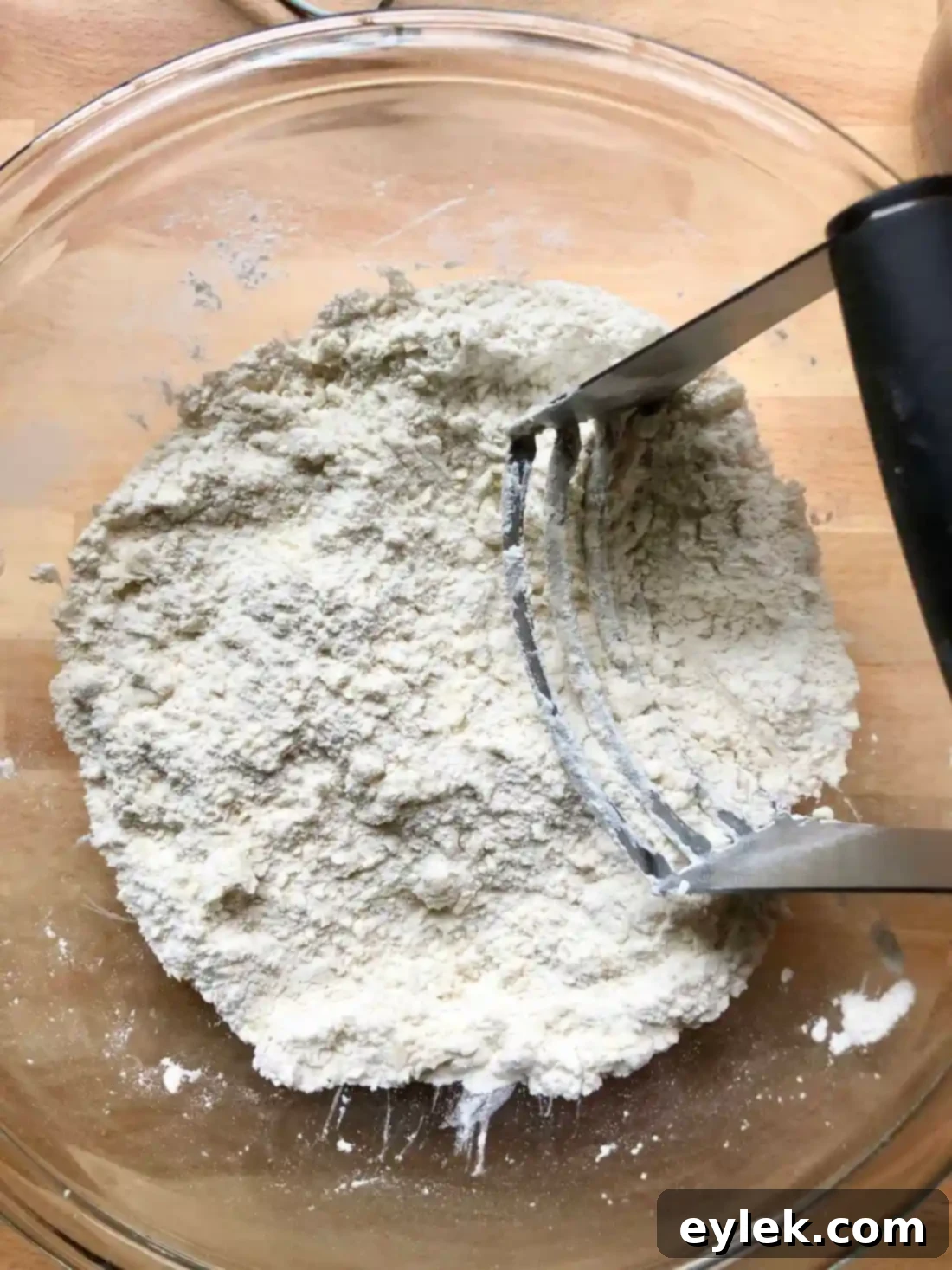 authentic homemade flour tortillas cutting butter into flour