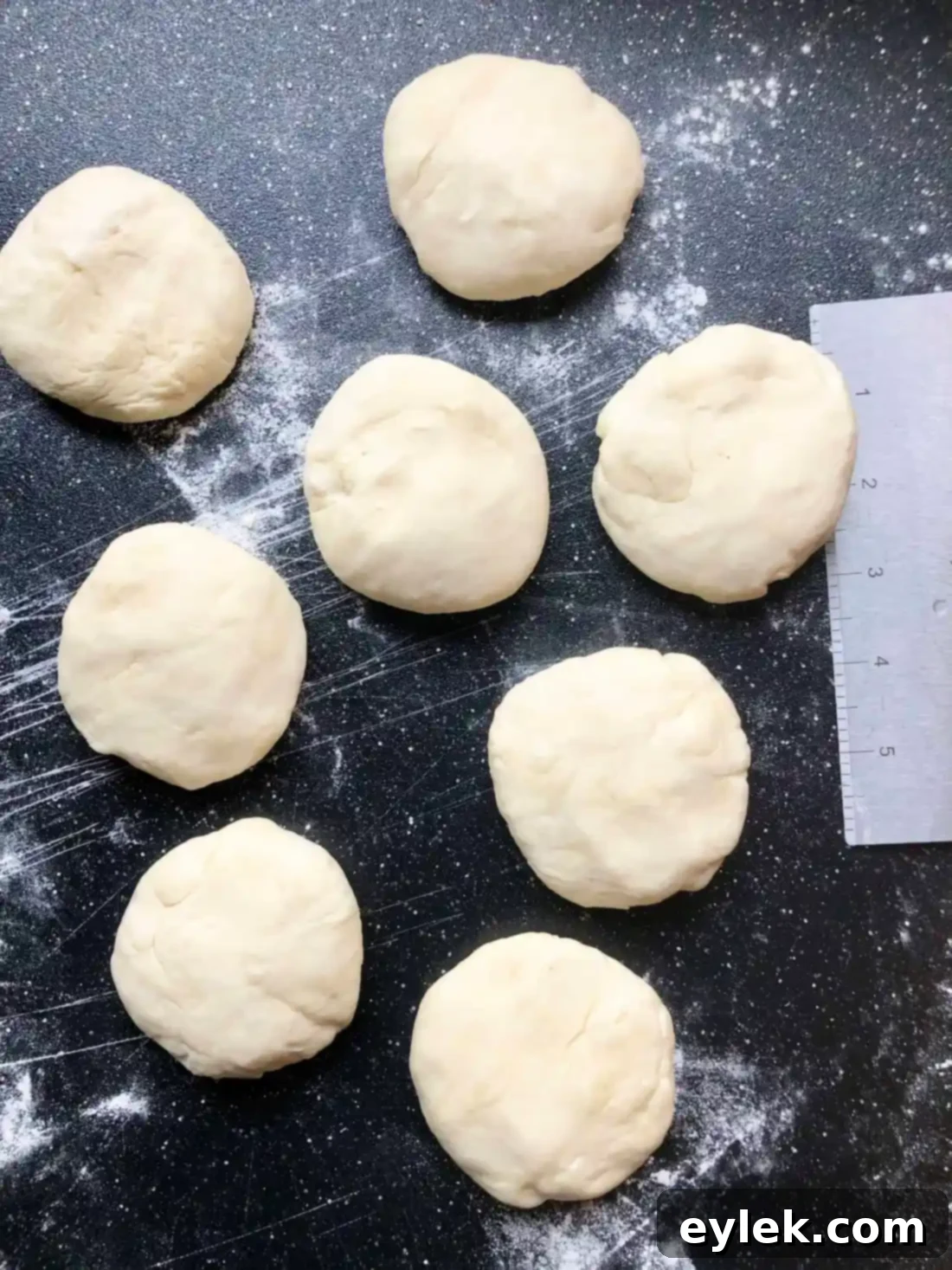 authentic homemade flour tortillas dividing dough