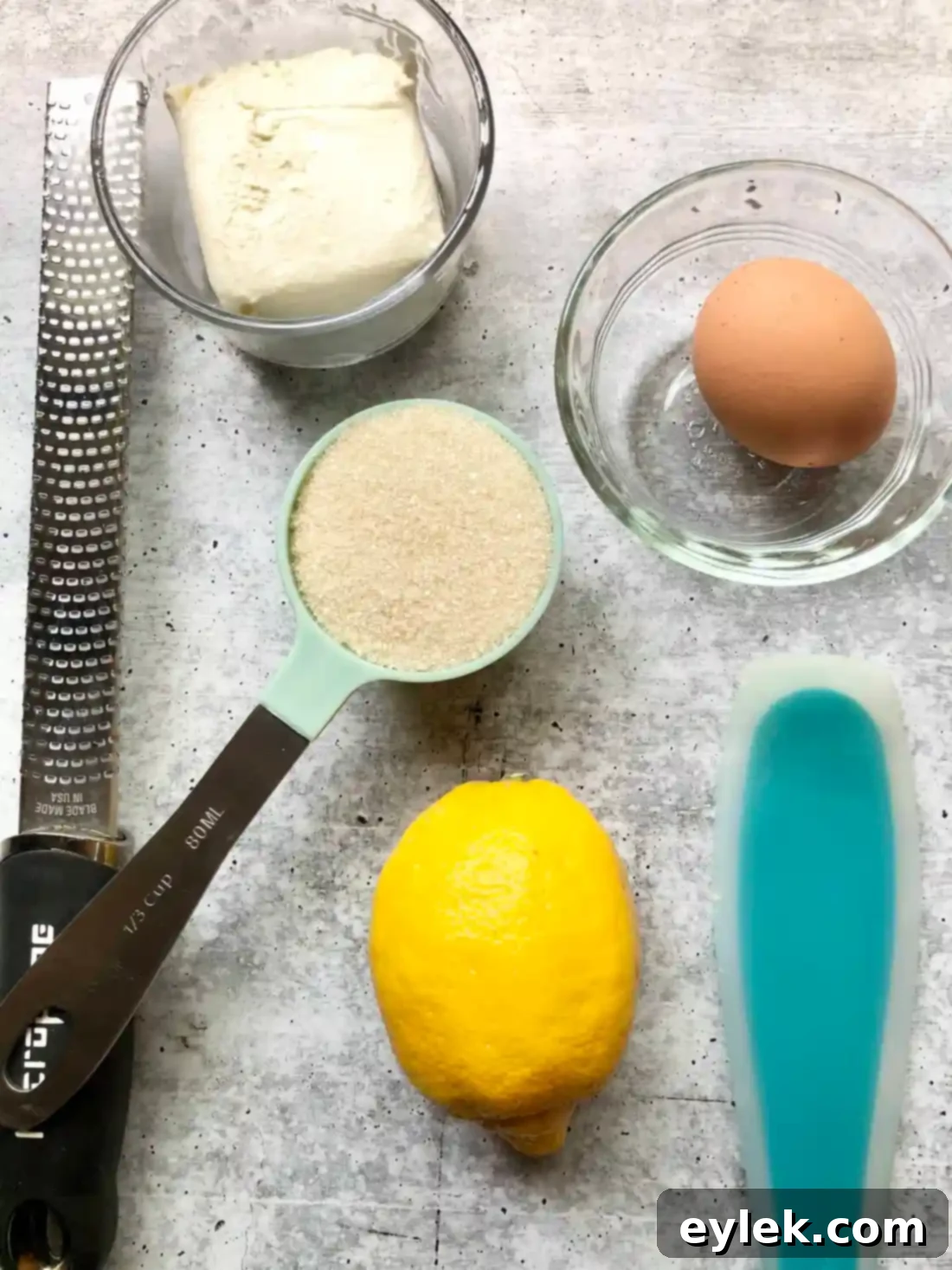 Cream cheese, sugar, lemon zest, and egg yolk for cream cheese filling