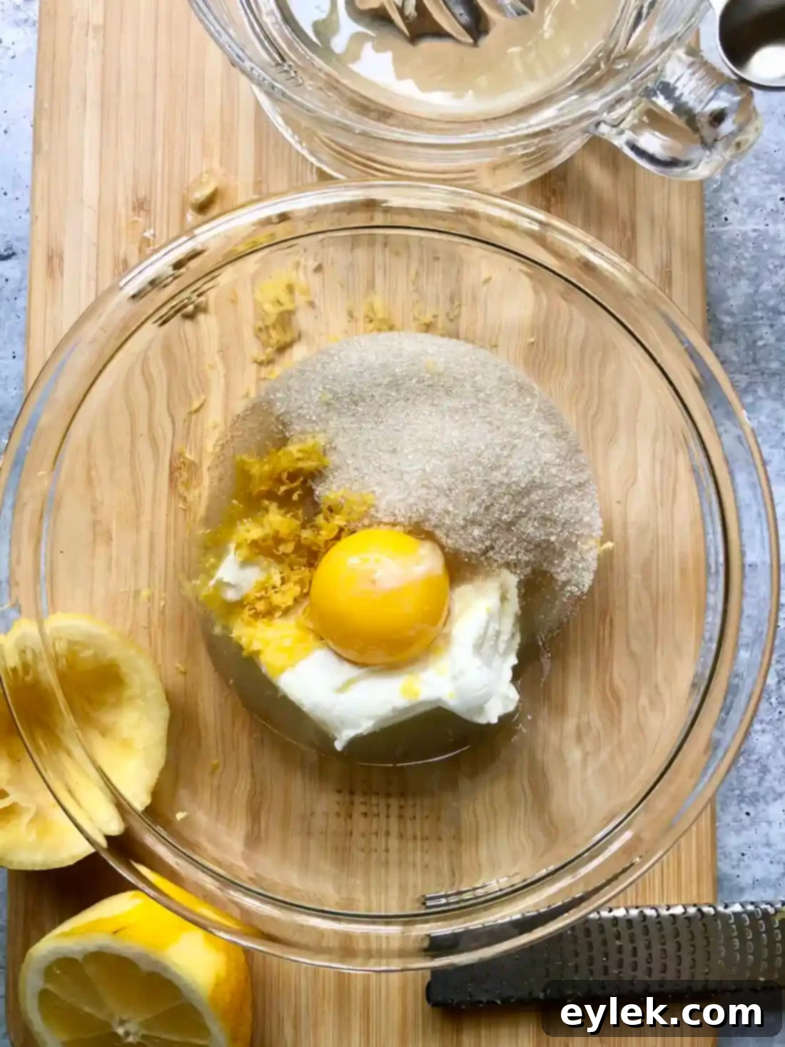 Cream cheese, sugar, lemon zest, juice, and egg yolk whisked together for filling