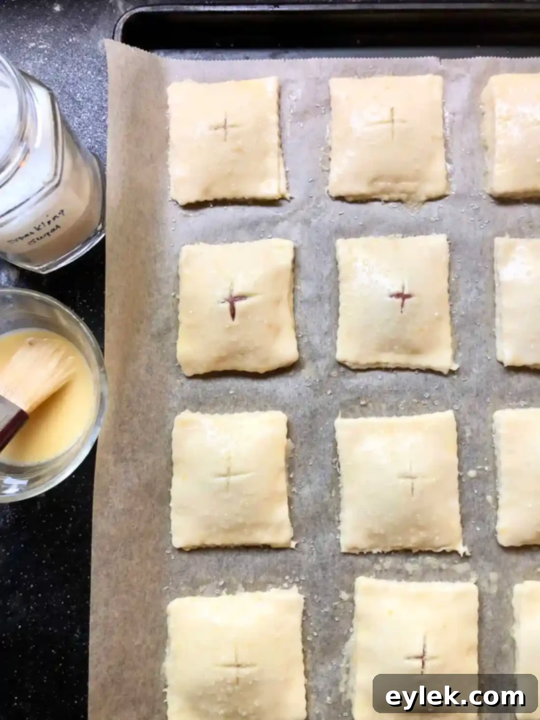 Sealing the edges of Rhubarb & Cheese Hand Pies with a fork