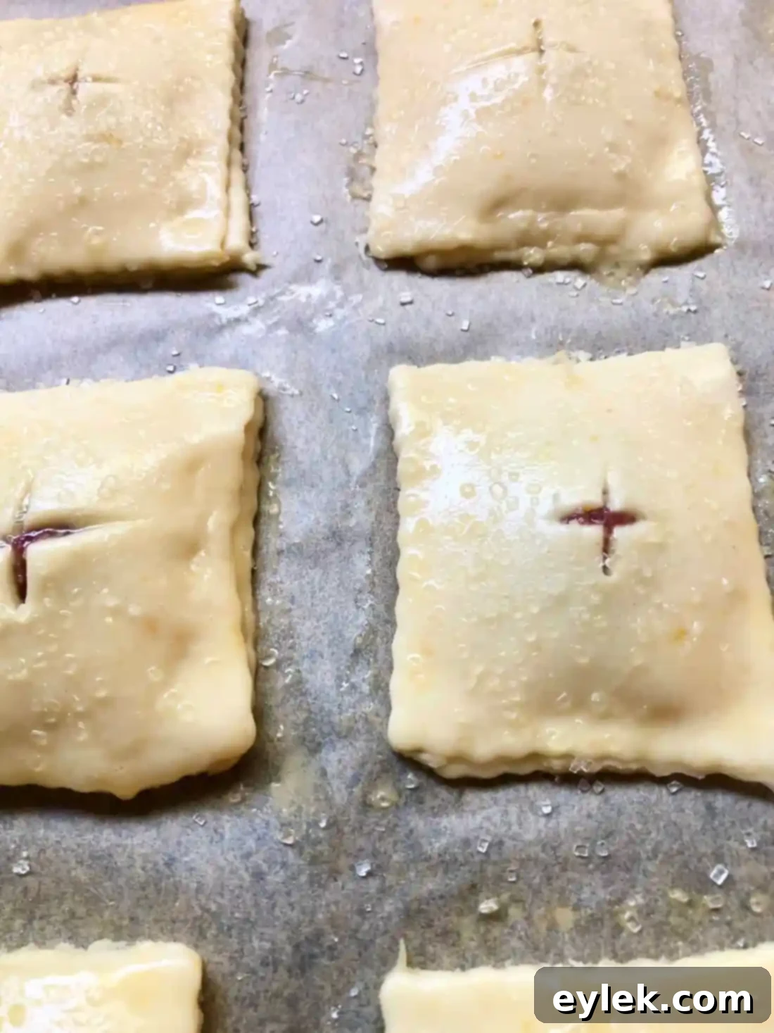 Rhubarb & Cheese Hand Pies brushed with egg wash and sprinkled with sugar