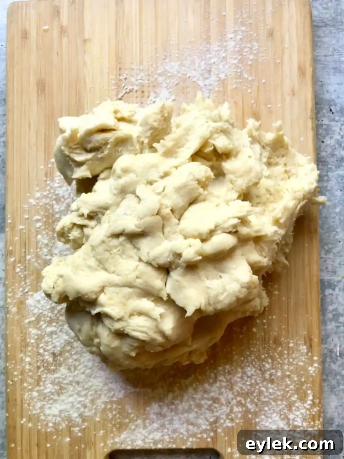 Pie dough forming a cohesive mass in the food processor
