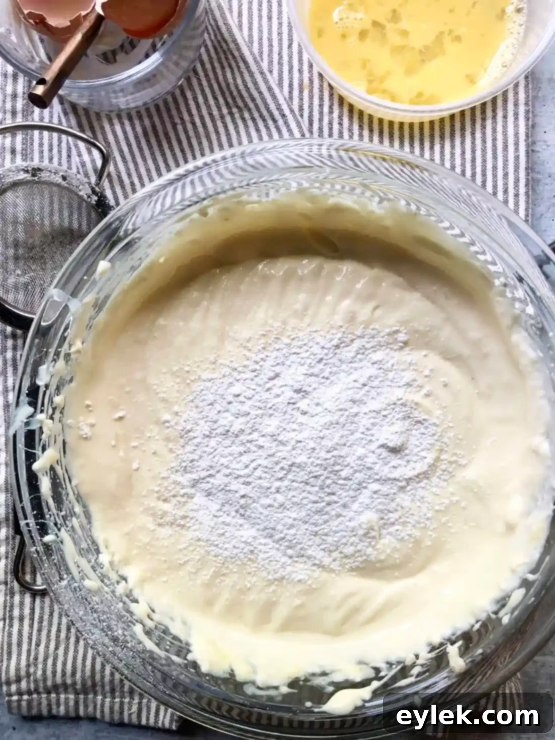 Smooth cheesecake batter ready for pouring.