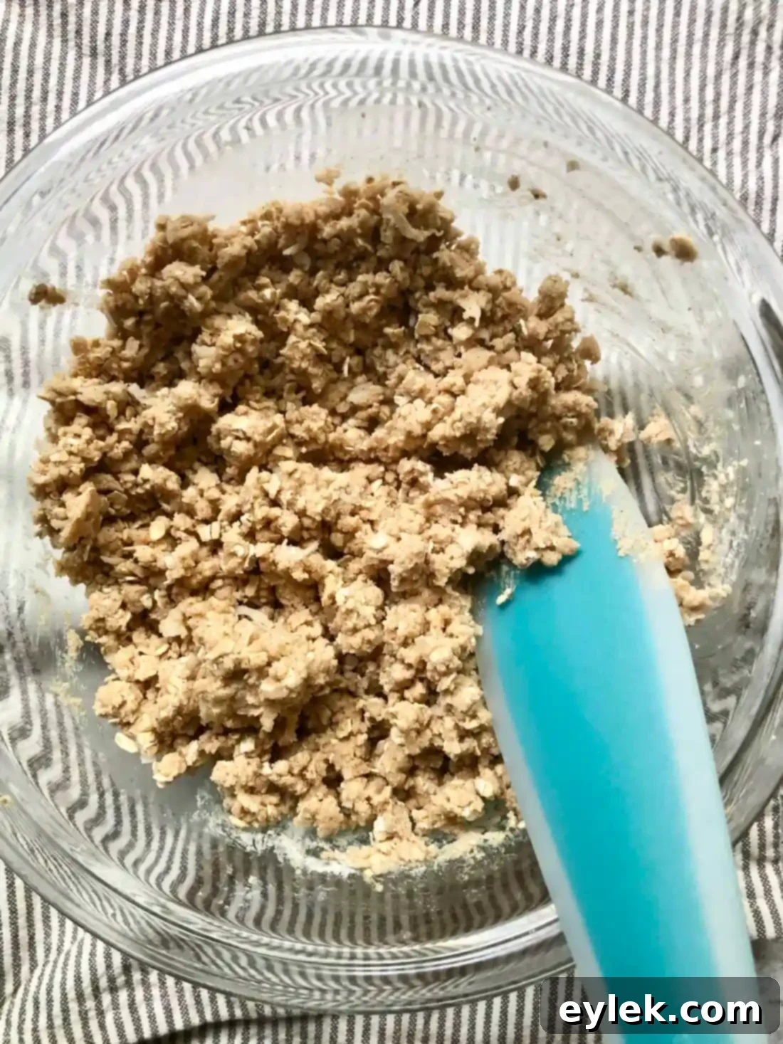 The crumble base, evenly pressed into the baking pan.