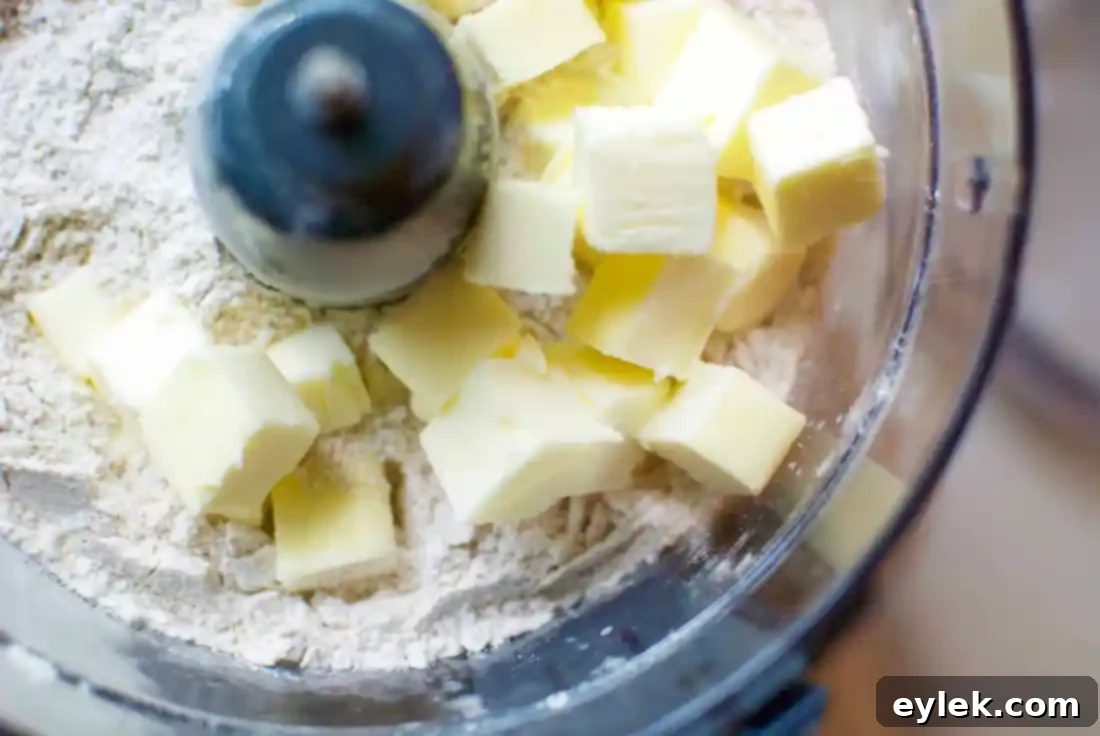 The dough coming together in a food processor.