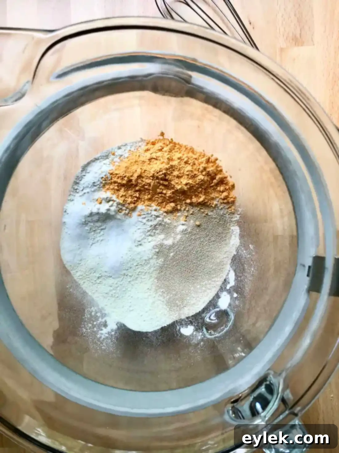 Mixing dry ingredients for pizza dough