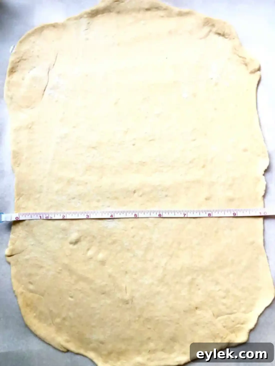 Dough with marked sections for the pizza braid