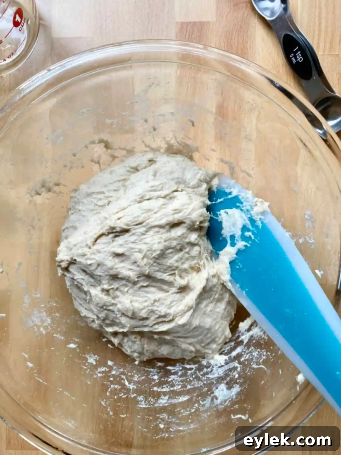 Never-Fail Sandwich Bread - Greasing a loaf pan with butter