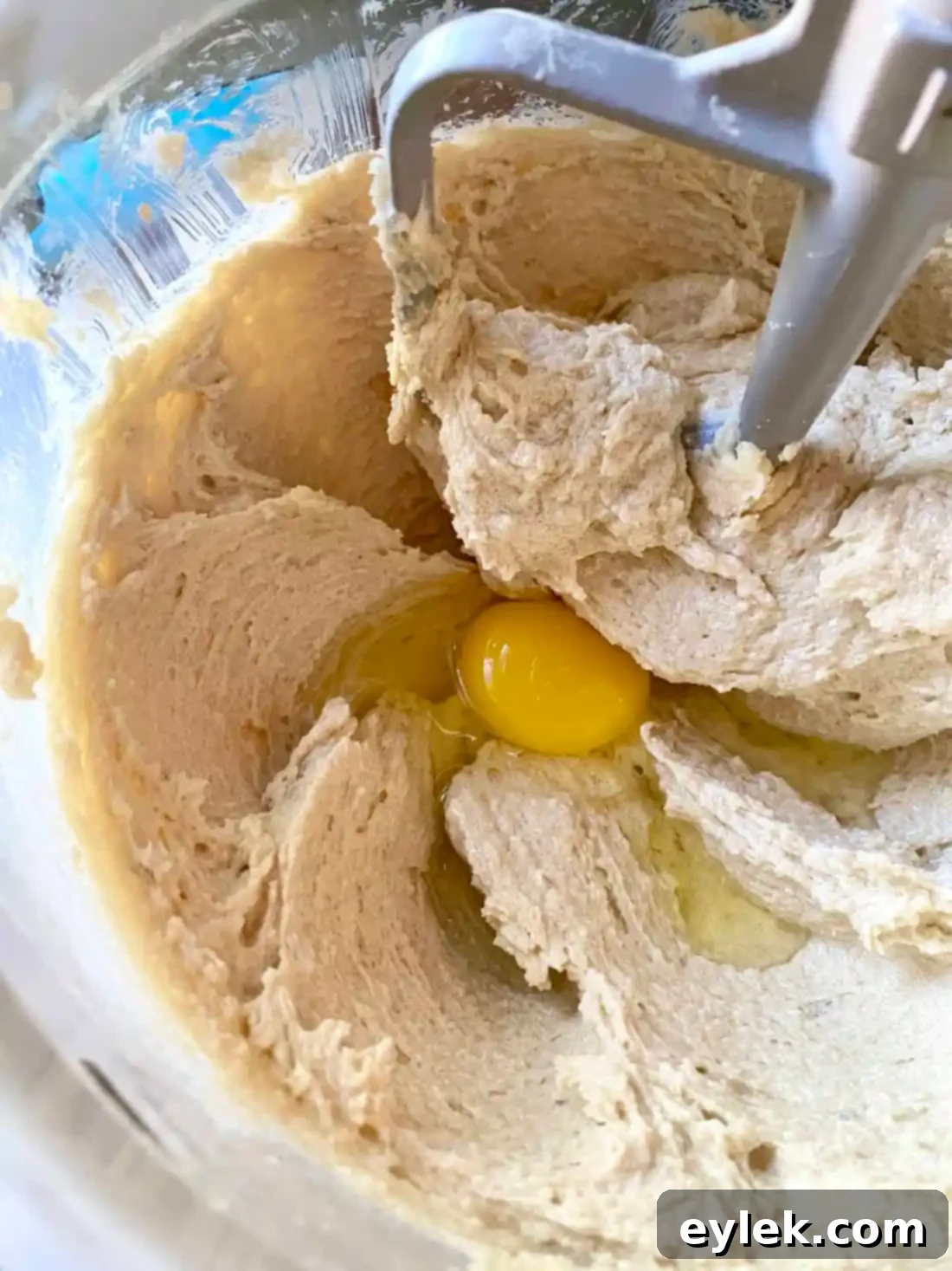Adding wet ingredients to cookie dough