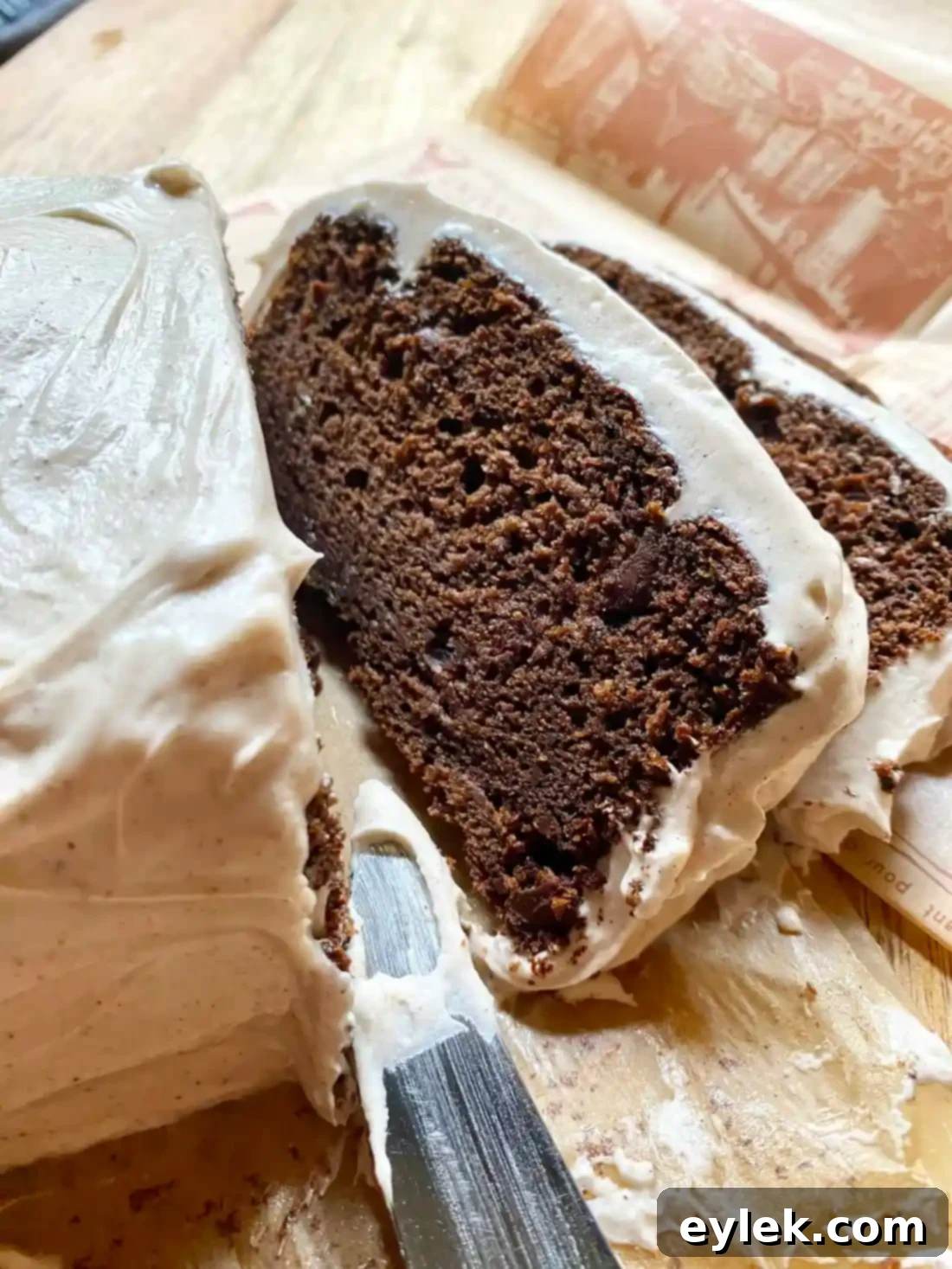 Sliced Spiced Chocolate Pumpkin Cake with Chai Frosting