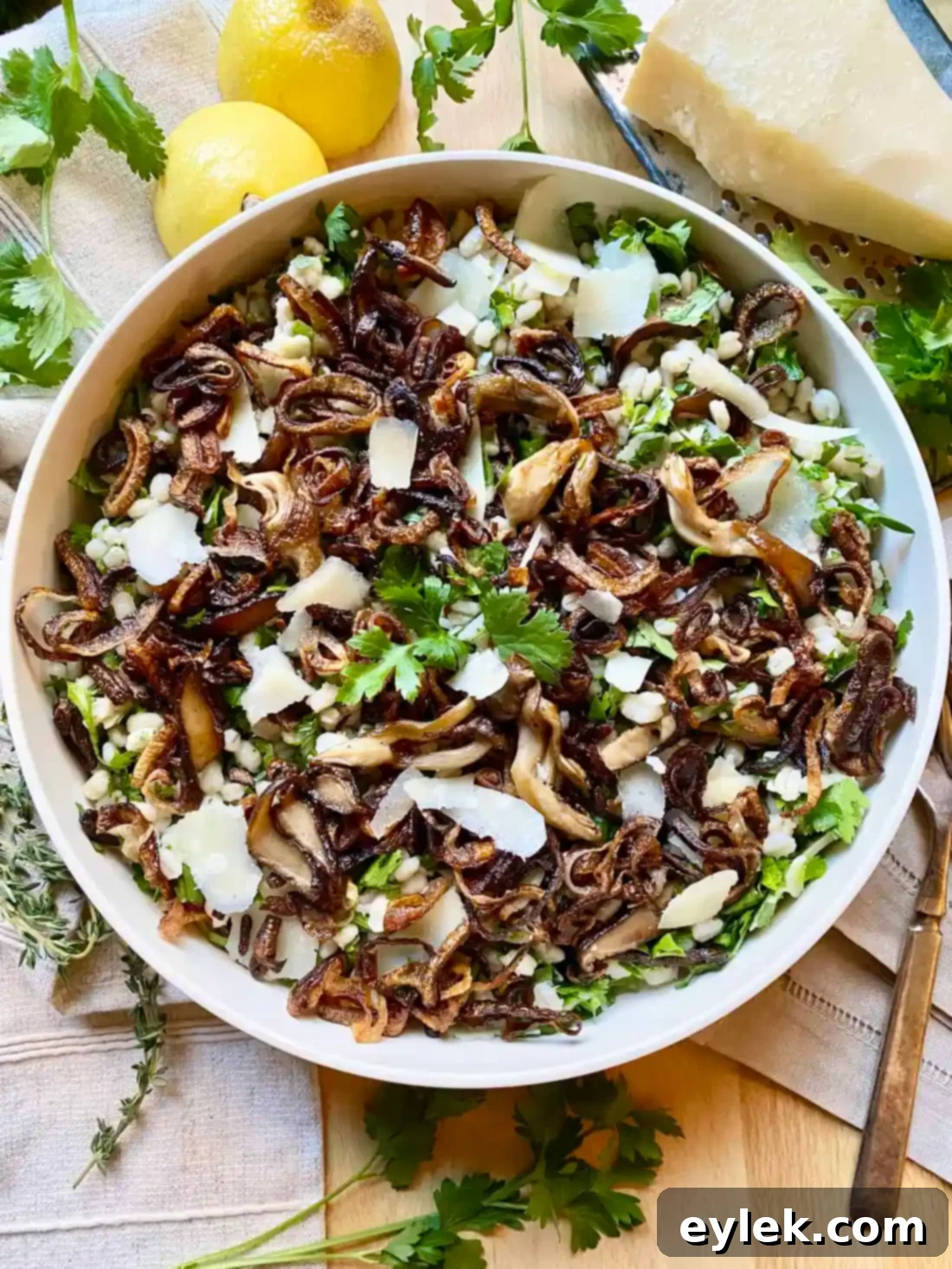 A bowl of Herby Barley Salad with Buttery Mushrooms from a different angle, showcasing its fresh ingredients